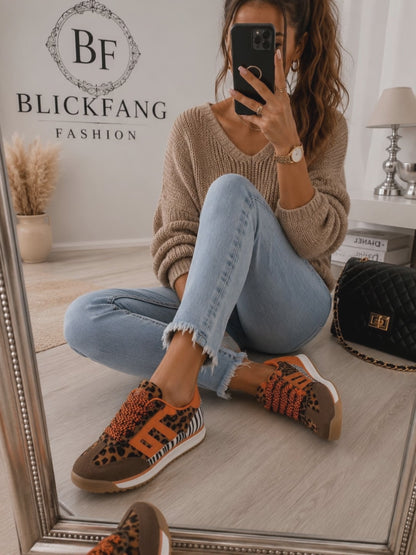 Leo-Zebra Sneaker – Trend-Highlight in Orange 🧡